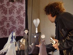 tim burton with maquetttes from corpse bride